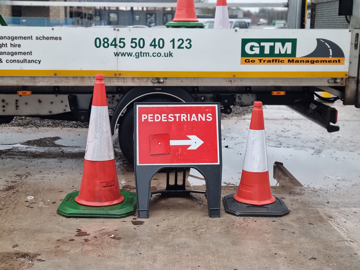 pedestrian signage with Go Traffic Management truck in background